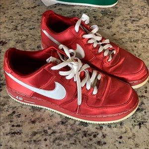 red shiny nike shoes